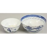 A Chinese blue and white bowl, decorated with figures, diameter 11.5 cm and another, larger de