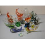 A collection of seventeen glass fish models.