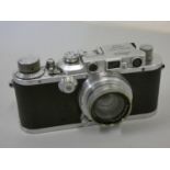 A Leica III, c.1934, with F2 Sumar F2 lens, serial number 140059, case.