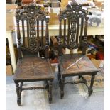 A pair of mahogany framed tub chairs, turned spindle back supporting upholstered arm and upper