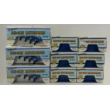 A large collection of boxed of Ertl die-cast machinery implements. including- plows and waggons