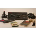 Sinclair Spectrum +2A (black version) with user manual, defender light phaser, spectrum joystick,