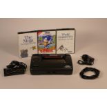 Sega Master System II console, power supply, control pad, TV lead. Including three games Sonic the