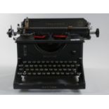An Imperial Model 50 standard typewriter complete with instruction book, together with another