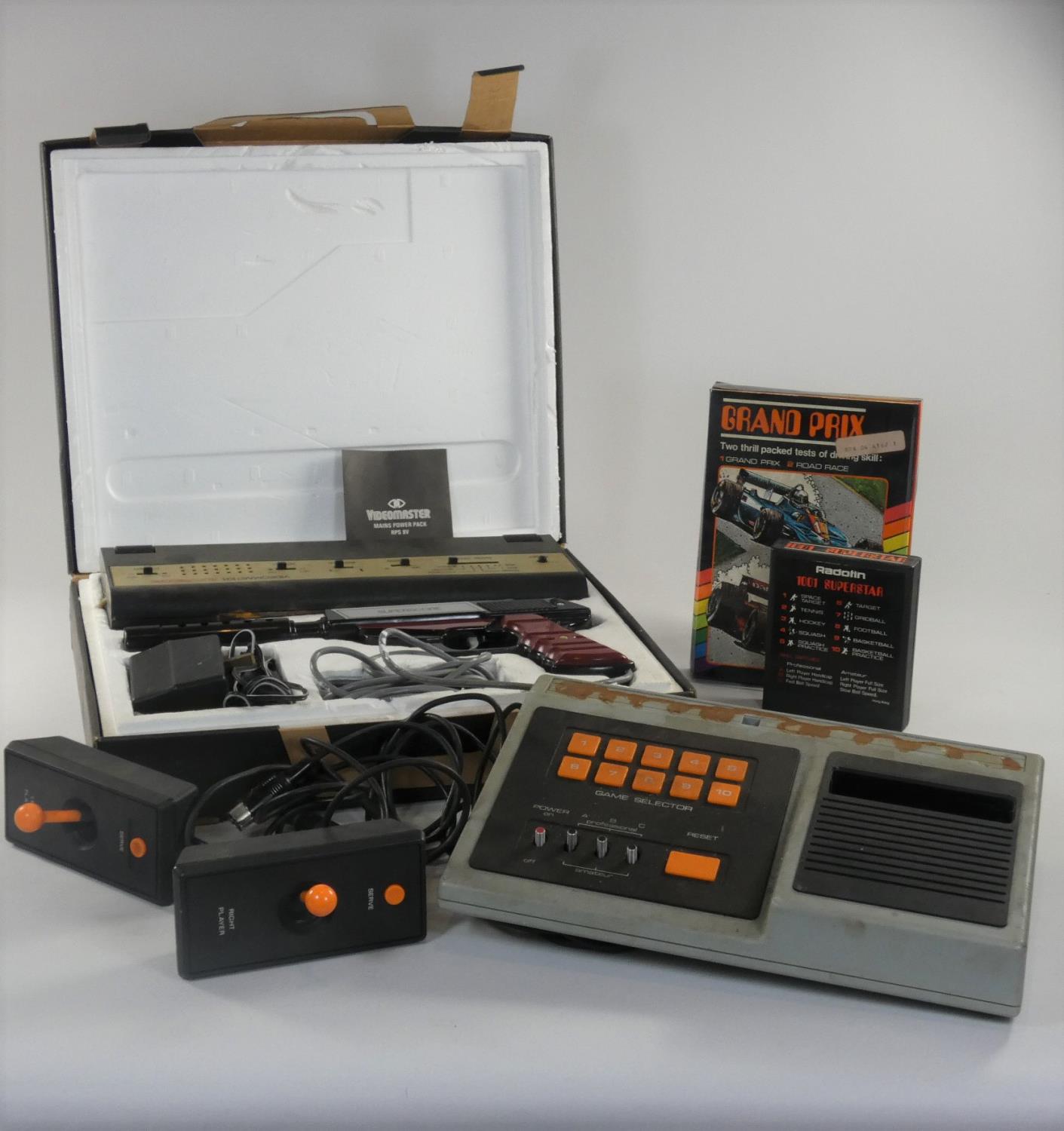 A Videomaster Superscore boxed. Together with Radotin games console, controllers and 2 games.