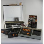 A Videomaster Superscore boxed. Together with Radotin games console, controllers and 2 games.