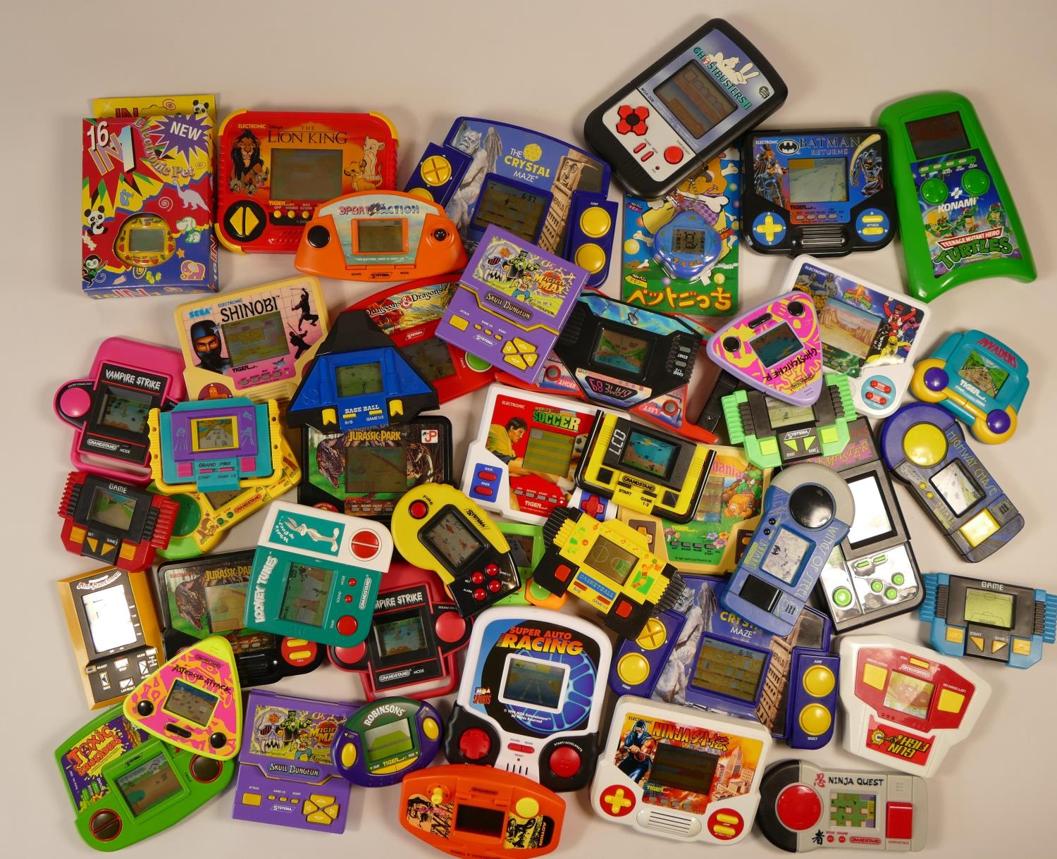 Collection of over 30 hand held electronic games from the the 1980s/1990s. To include-