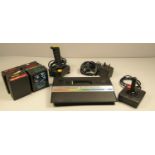 Atari 2600 Console, two joystick, power adapter, TV connecting lead and games including-
