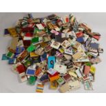 A large quantity of early cigarette packets and matches