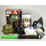 A collection of Star Wars collectibles including a Boba Fett 3D deco light, neck purses, ceramic