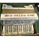 Two cased "Pietro" piano accordions (2)