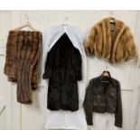 A ladies fur coat, retailed by Ross of Leeds, a short fur coat,
