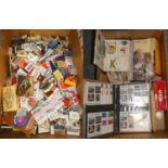 A collection of loose cigarette/tea cards, 2 albums of first day covers and assorted match boxes (