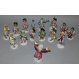 A set of fourteen late Dresden Monkey Band figures, crossed sword mark, the conductor 17 cm together