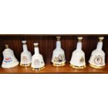Bells Scotch Whisky commemorative decanters by Wade, compromising of The Birth of Prince William,