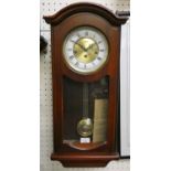 A contemporary Vienna style mahogany wall clock by Hermle, Westminster chime, instructions, key,