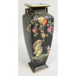 A Staffordshire Japanese style vase, decorated with figures beneath lanterns on matt black ground