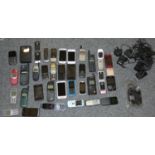 An iphone and a quantity of other mobile phones, no chargers and untested.