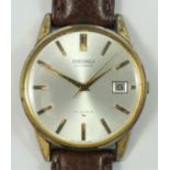 A Seiko, gentleman's automatic date wristwatch, circa 1971, the silvered dial with baton markings,