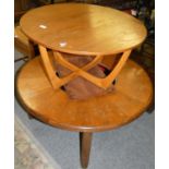 A teak circular coffee table 97 cm diameter with central glass insert together with a smaller