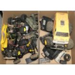 A collection of radio controlled model cars, handsets and spares.