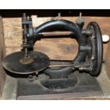 A Wanzer manual sewing machine, circa 1880, decorated with black lacquer, Time Utilizer Trade