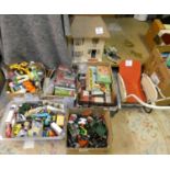 Five boxes of toys, die cast, games, a dolls house, dolls pushchair and a model aircraft (