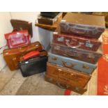 A selection of leather and other suitcases, satchels and a wooden box marked Oldfields, wine