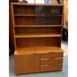 A Mcintosh teak illuminate wall unit, 120 cm wide, 170 cm tall, the top comprising 3 shelves, the