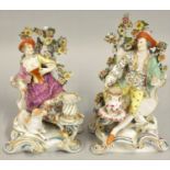 A pair of late 19th century continental figural candlesticks, possibly Sitzendorf, unmarked,