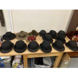 An assortment of hats including, Bowler, Trilby and Bush hats.