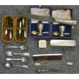 Two silver egg cups with spoons, Birmingham 1971, cased, a silver inkwell, Birmingham 1910 and other