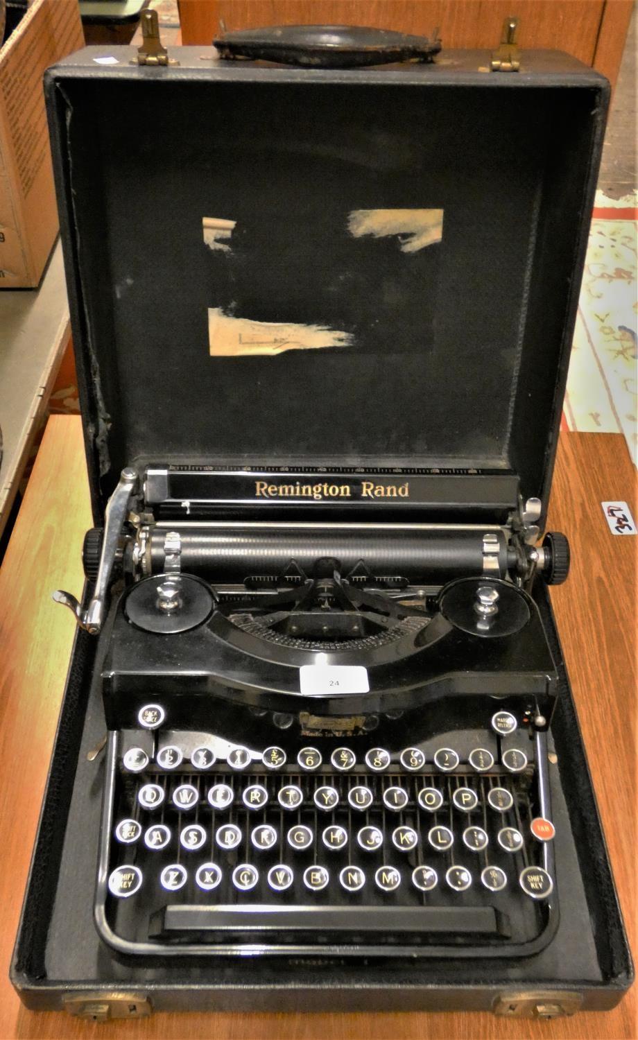 A Remington Rand model 1 typewriter, case.