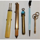 A Mordan & Co. double retracting pencil, a silver and enamel pencil and three other items.