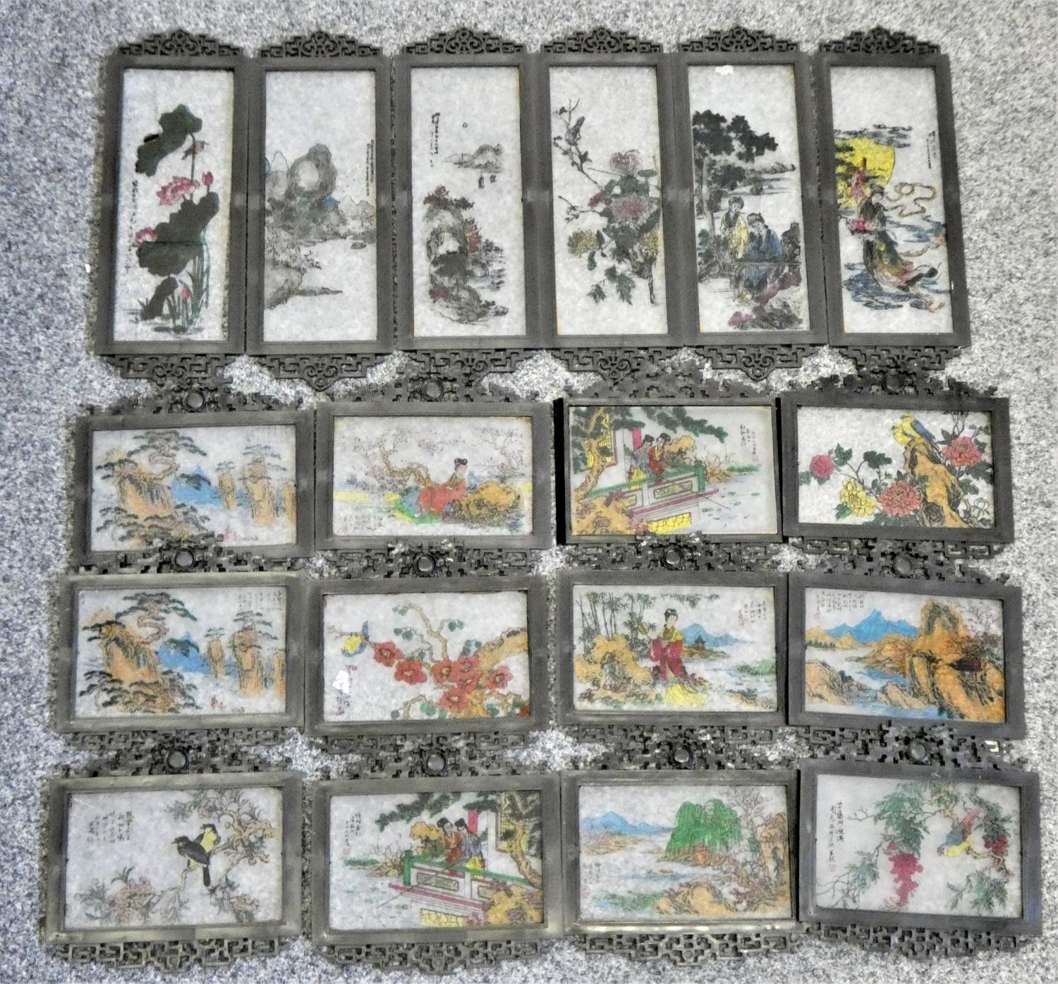 Eighteen mounted glass panels decorated with Oriental scenes.