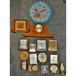 A box of over thirty assorted clocks, including anniversary, mantle and wall clocks.