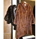 A fur coat and fake fur jacket.