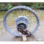 A Norton Enfield type back wheel, c. 1927-1930, 8 inch brake drum with brake plate and shoes.