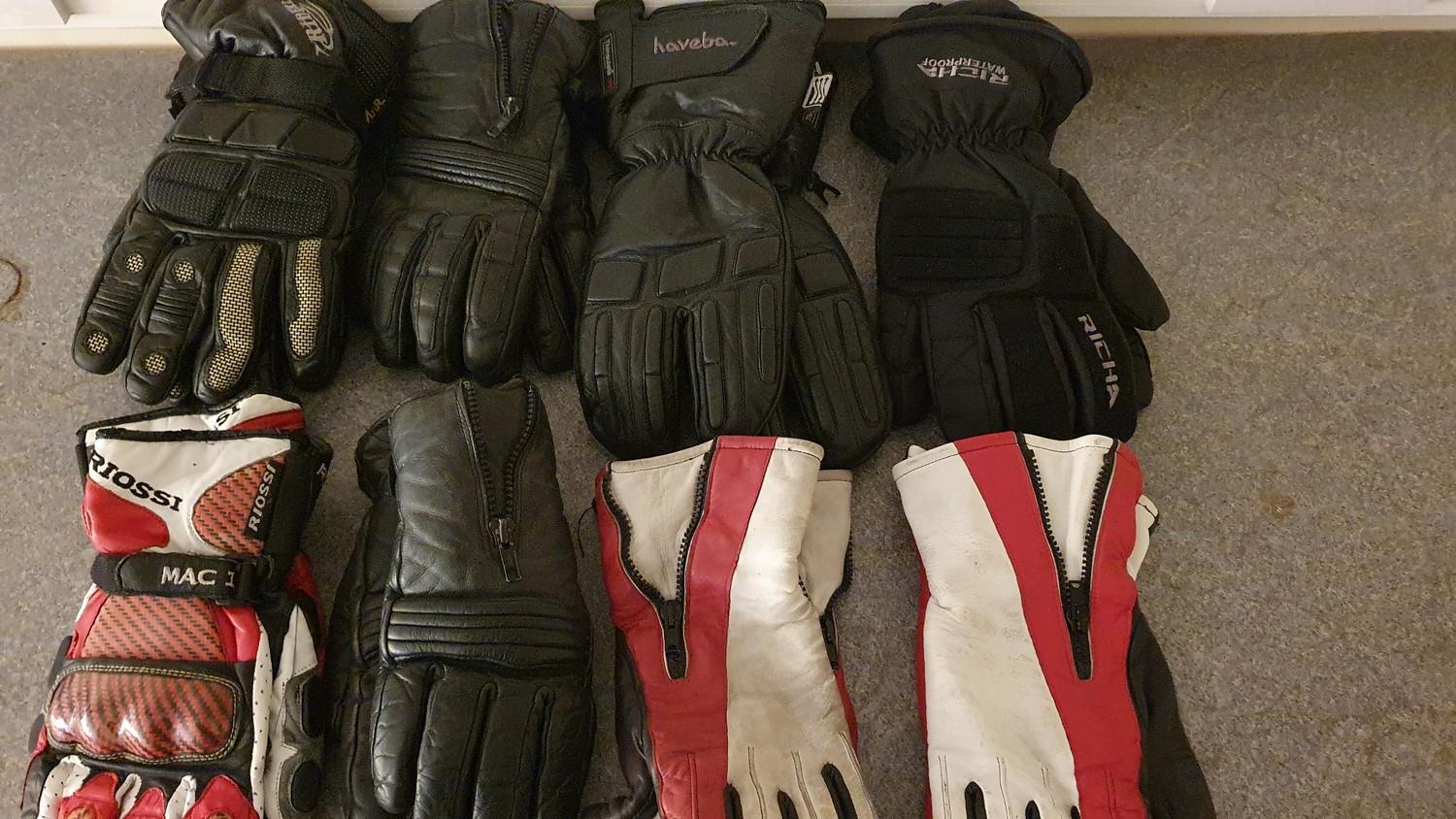 Eight pairs of motorcycle gloves