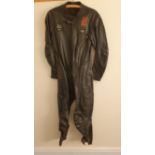 A Lewis Leathers one piece racing suit, patch to right thigh, size 40.