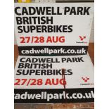 A pair of Cadwell Park, British Superbike plastic signs and an alloy Safty First Save Haven sign, 40