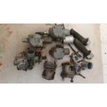 A Mikuni carb, three Amal carbs and other related parts