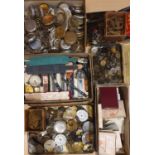 A collection of pocket watch spare parts, dials and cases