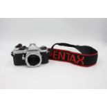 Pentax ME Super SLR Film Camera (Body ONLY) The camera is WORKING and in a good condition Winds