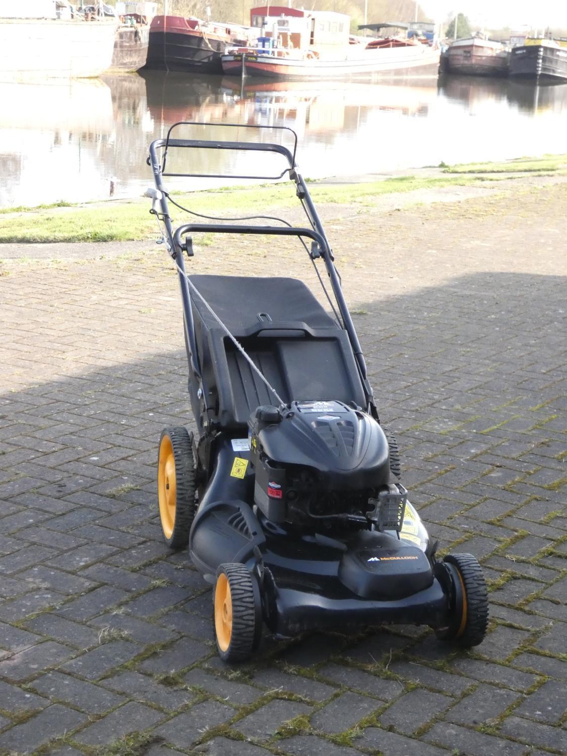 A petrol driven, self propelled Mcculloch lawnmower, with a Briggs and Stratton 625E series