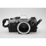 Olympus OM10 SLR Film Camera (Body ONLY) w/ Manual Adapter (Allows User to Change Shutter Speeds)