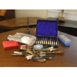 A collection of letter openers together with cased manicure set,a cased sewing set, etc