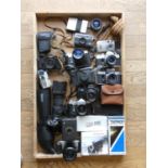 A collection of including a Nikon F-301, a Nikon EM and a Zorki-4 along with other various
