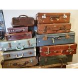 A collection of ten various sized vintage suitcases, together with a leather Gladstone bag. (11)