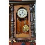 A Vienna style regulator type wall clock with two part enamel dial and 4 other clocks